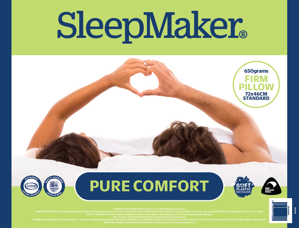 SleepMaker Pure Comfort Firm Pillow packaging, featuring a light green and white design with a photo of a couple lying in bed forming a heart shape with their hands. The brand name 'SleepMaker' is prominently displayed at the top.